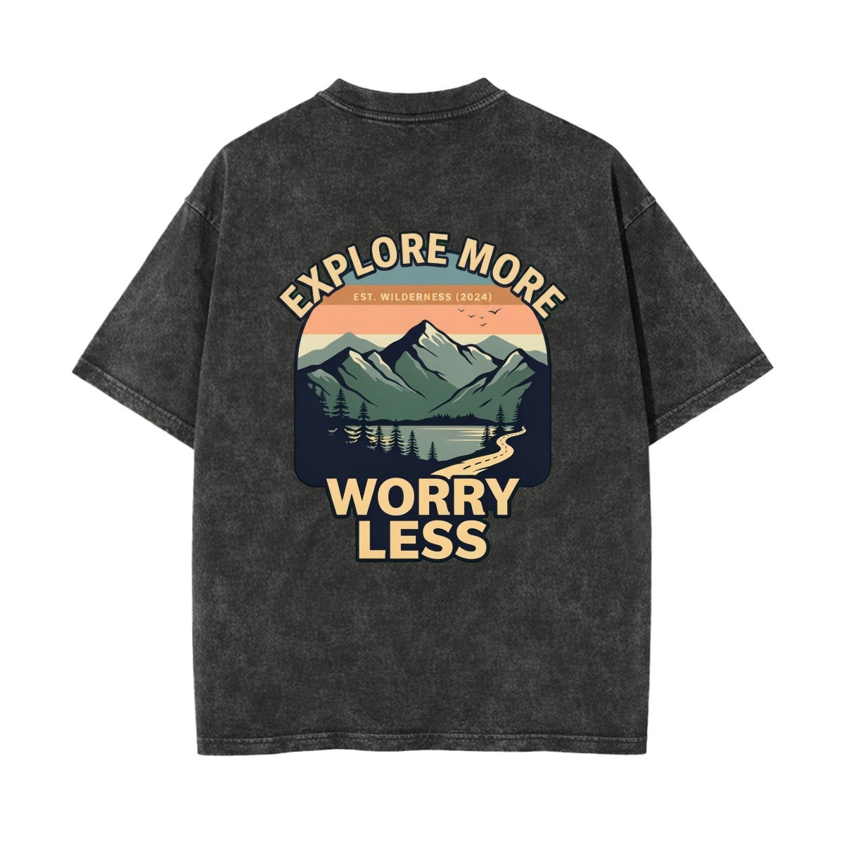A dark gray wash t-shirt shown from the back, featuring a large graphic print of a mountain landscape with a lake and a winding road, surrounded by the text 'EXPLORE MORE' and 'WORRY LESS'.