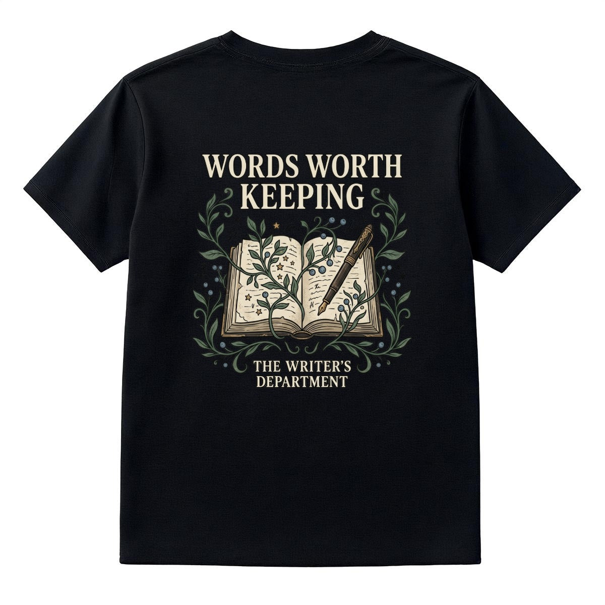 A black short-sleeve t-shirt shown from the back, featuring a graphic print of an open book with a quill and the text 'WORDS WORTH KEEPING' and 'THE WRITER'S DEPARTMENT' in cream and green.