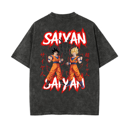 A dark gray acid-wash t-shirt shown from the back, featuring a large graphic print of Goku and Vegeta in orange fighting stances with 'SAIYAN' written in stylized red and white text.