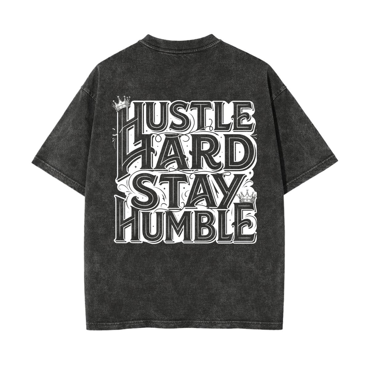 A dark gray mineral-wash t-shirt with a large white graphic text print reading 'HUSTLE HARD STAY HUMBLE' on the back, shown against a plain white background.