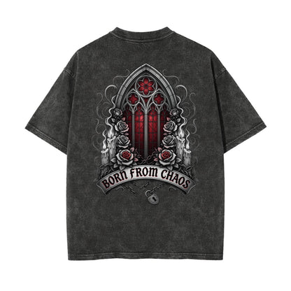 A dark gray mineral-wash t-shirt shown from the back, featuring a large graphic print of a gothic cathedral window with red rose details and the text 'BORN FROM CHAOS'.