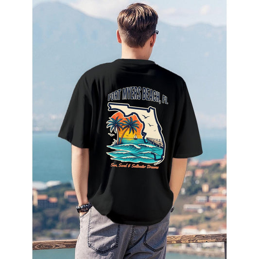 A man viewed from behind wearing a black t-shirt with a large graphic print of the Florida peninsula shaped like a map, featuring palm trees, a sunset, and waves, with the text 'FORT MYMER BENCH, FL' and 'Sanibel & Sailmelie Beach'.