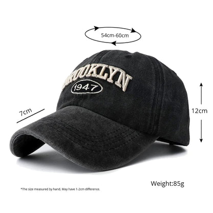 Black baseball cap with 'Brooklyn 1947' embroidery, shown with measurements on a white background.