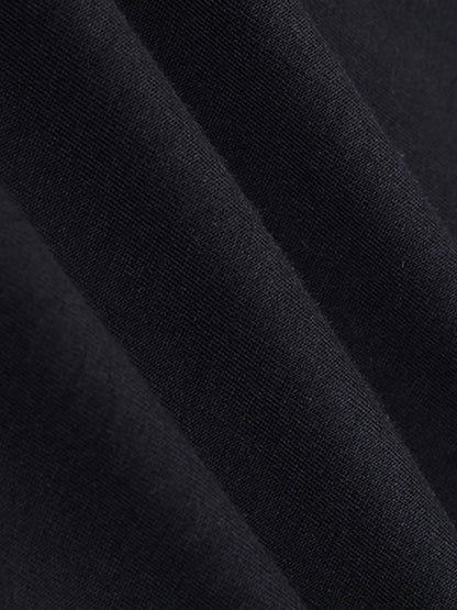 Close-up of black t shirt fabric with a textured pattern
