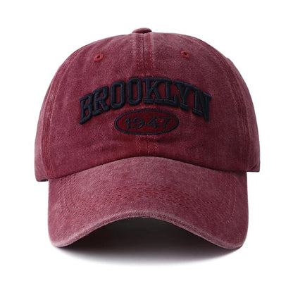 Maroon embroidery baseball cap with 'Brooklyn 1947' text on a white background