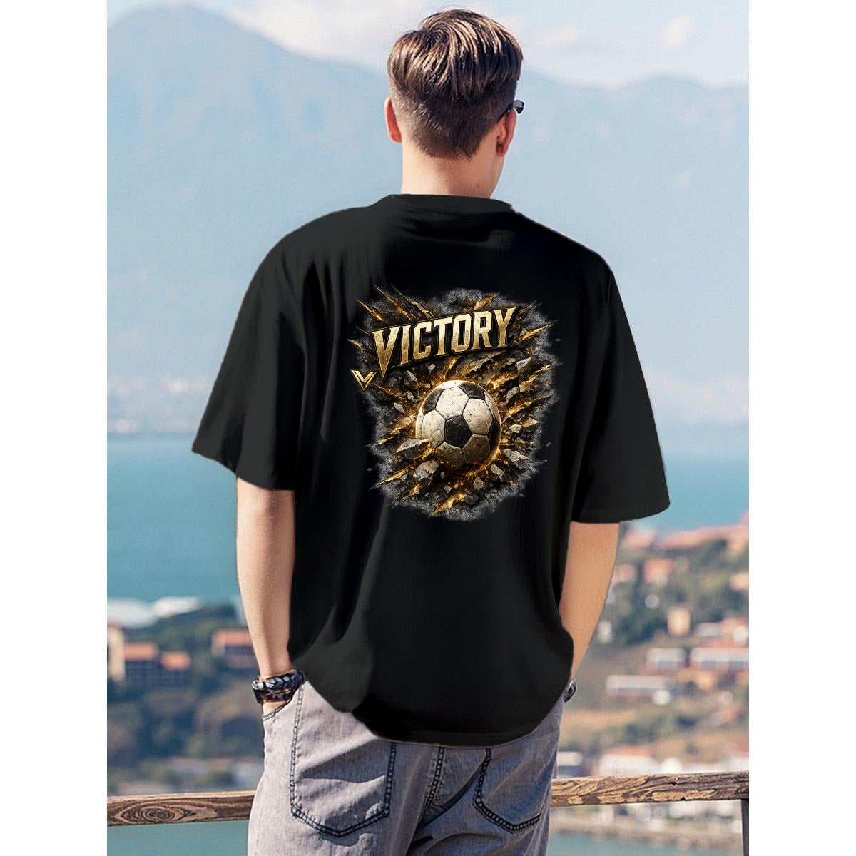 Black Victory football t shirt with gold soccer ball graphic