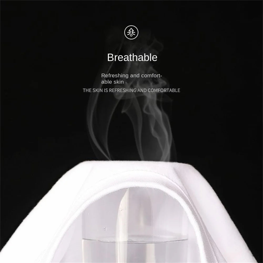 White plain breathable t shirt with steam rising, labeled 'Breathable' on a black background