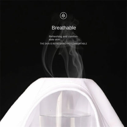 White plain breathable t shirt with steam rising, labeled 'Breathable' on a black background