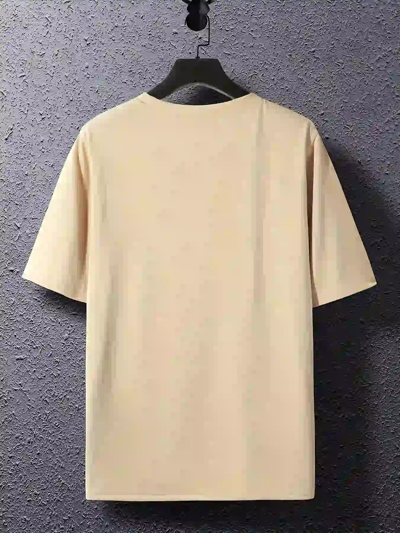 back view, Beige Moon phase graphic t-shirt on a hanger against a gray wall