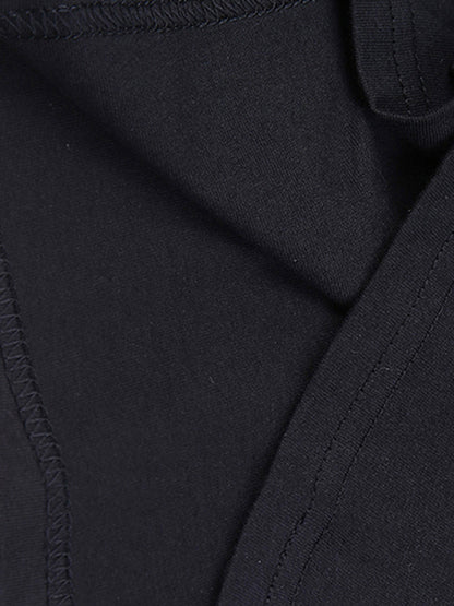 Close-up of a black fabric texture with stitching details