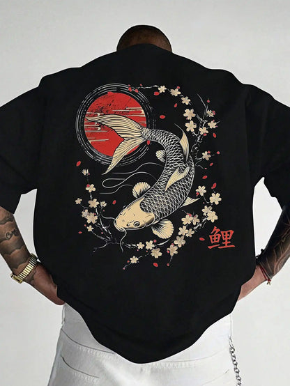 Person wearing a black koi fish oversized t shirt with a koi fish design on the back