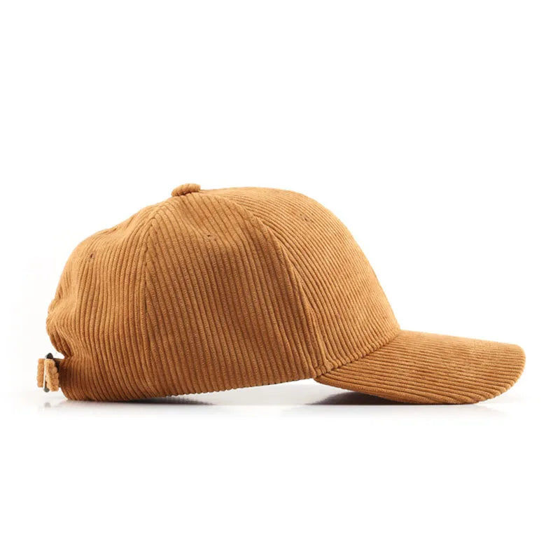 brick yellow corduroy cap on a white background