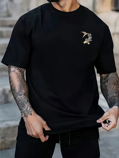 Person wearing a black koi fish t-shirt design on the chest, standing outdoors.