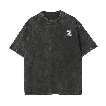 A dark gray acid-wash short-sleeve t-shirt with a small silver 'Z' logo on the left chest, displayed flat against a solid white background.